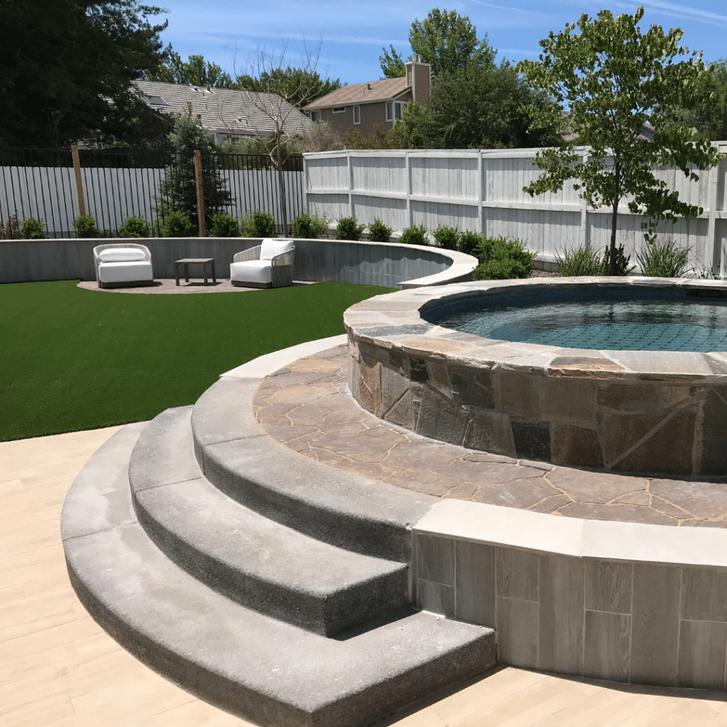 landscape design luxury resort-style poolside seating area